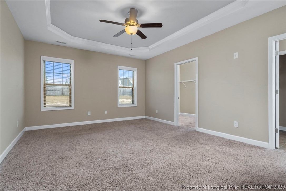 152 Copper Loop Sanford, NC 27332 - Photo 31 of 50 a view of an empty room with a window