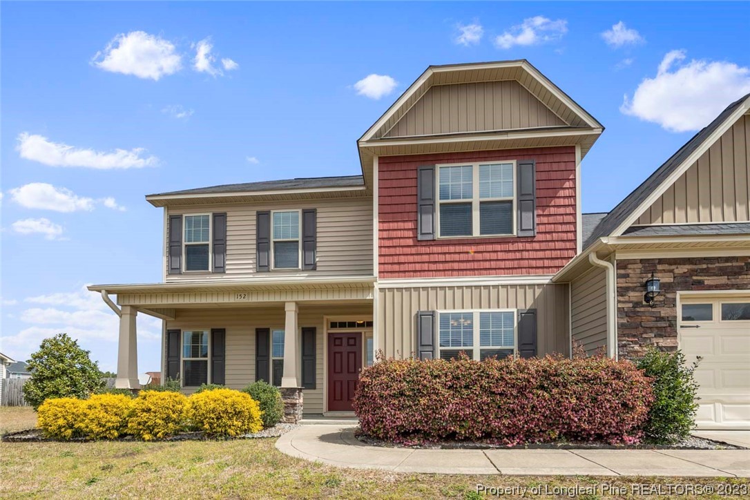 152 Copper Loop Sanford, NC 27332 - Photo 4 of 50 a front view of a house