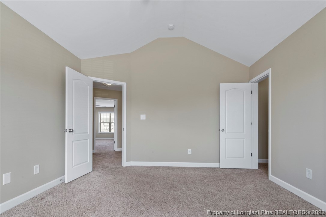 152 Copper Loop Sanford, NC 27332 - Photo 46 of 50 wooden floor and windows in a room