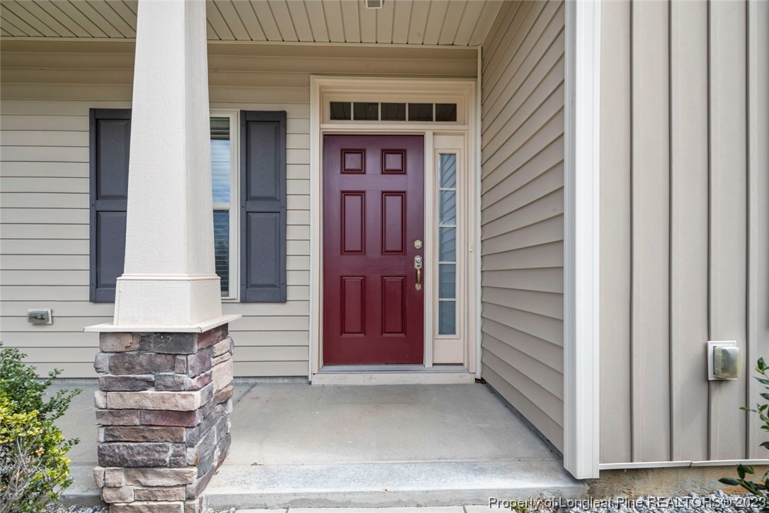 152 Copper Loop Sanford, NC 27332 - Photo 6 of 50 a view of entrance of the house