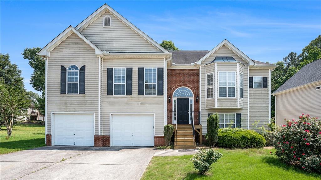3615 Perry Pointe Austell, GA 30106 - Photo 1 of 1 a front view of a house with a yard