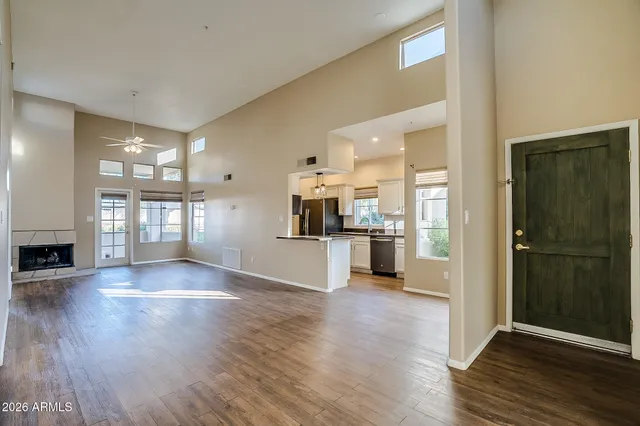 a view of kitchen with cabinets and wooden floor