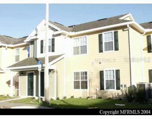 826 Enterprise Road, Unit 9103 DeBary, FL 32713 - Photo 1 of 1 front view of a brick building
