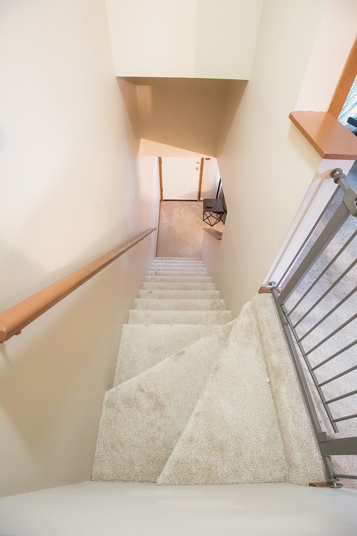 17297 Maple Lane Gurnee, IL 60031 - Photo 18 of 29 a bedroom with a bed and a night stand