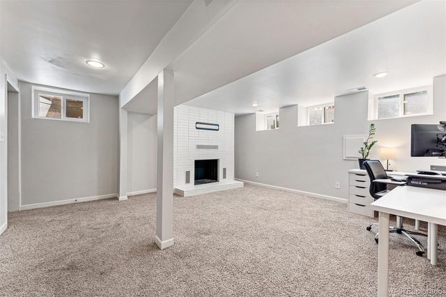 a workspace with furniture and natural light