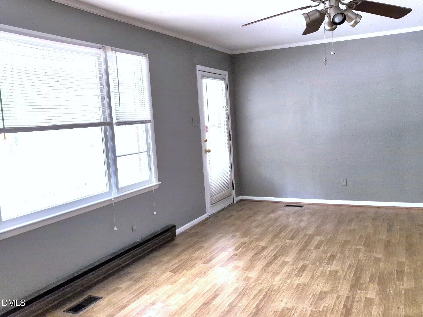 323 Ranch Farm Road Raleigh, NC 27603 - Photo 19 of 42 an empty room with a window