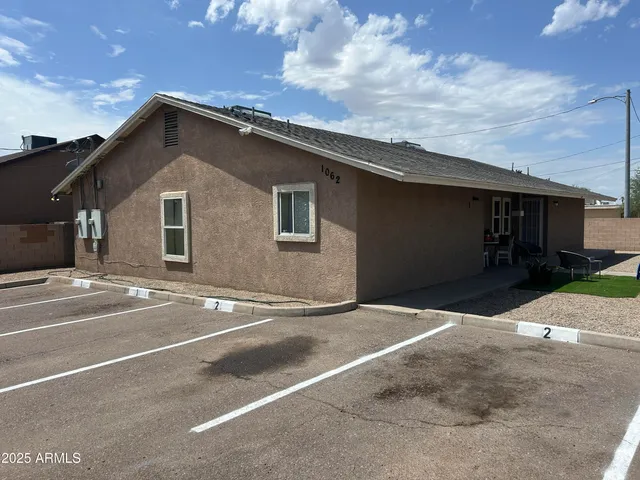 a backyard of a house with garage