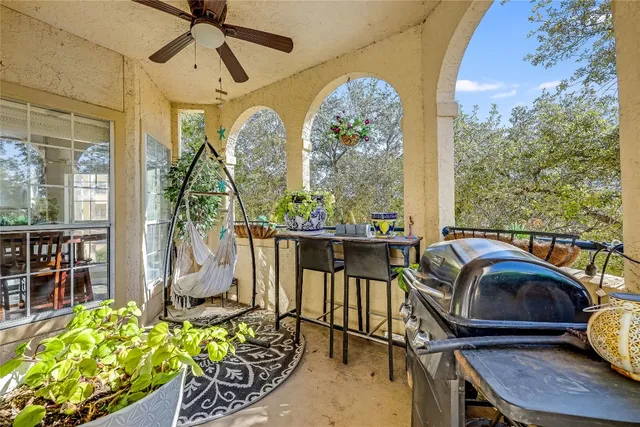 a view of a porch with furniture