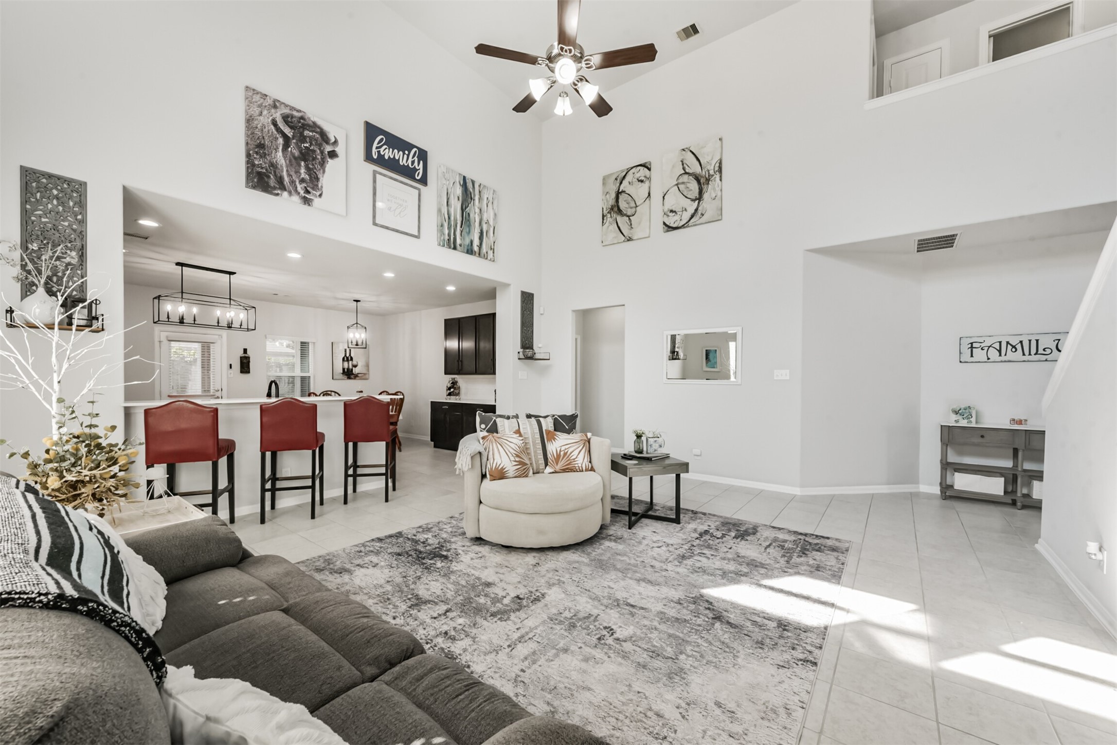 10018 Chase Court Baytown, TX 77521 - Photo 11 of 50 a living room with furniture and a dining table