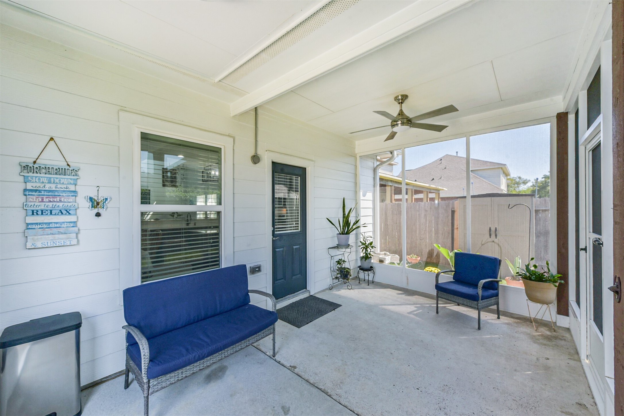 10018 Chase Court Baytown, TX 77521 - Photo 32 of 50 a living room with furniture and a chandelier
