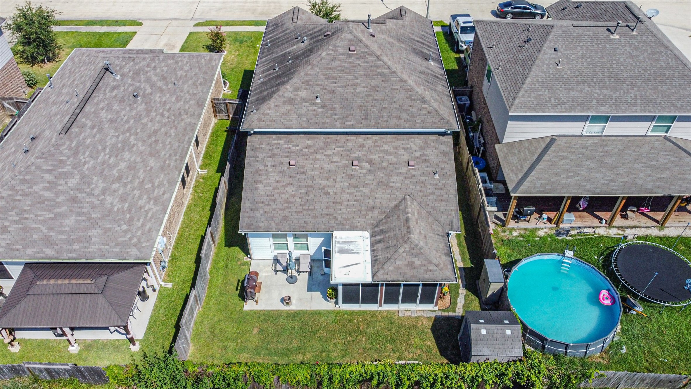 10018 Chase Court Baytown, TX 77521 - Photo 44 of 50 an aerial view of a house with swimming pool and garden