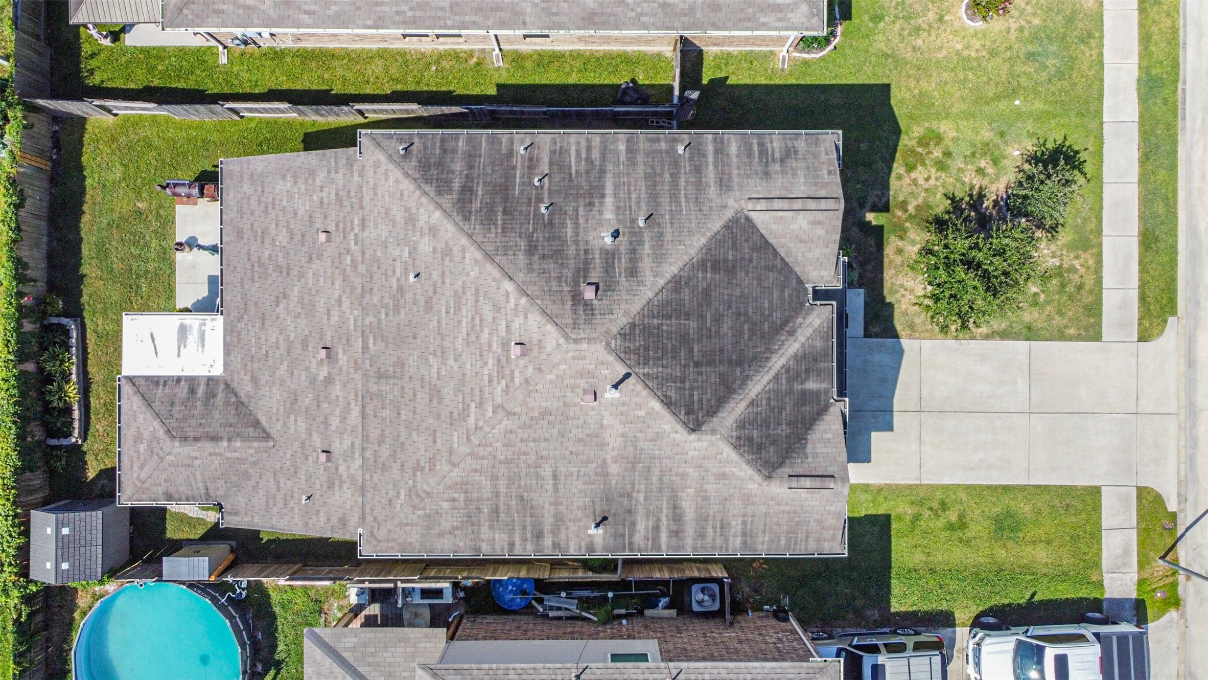 10018 Chase Court Baytown, TX 77521 - Photo 49 of 50 an aerial view of a house with a yard and large tree