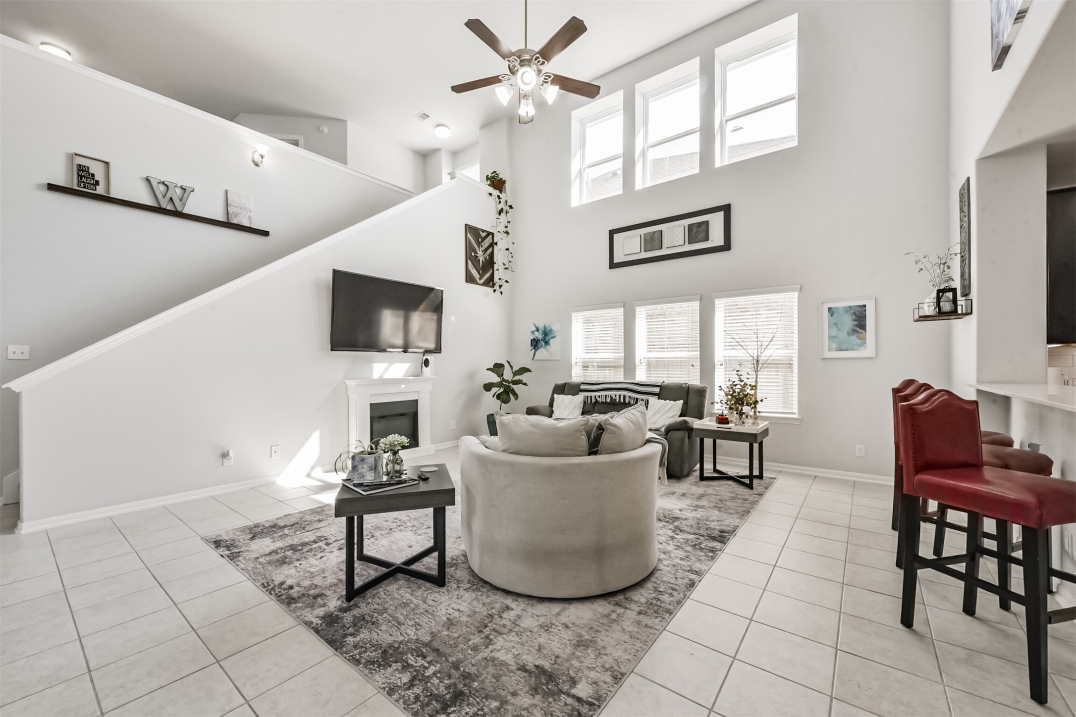 10018 Chase Court Baytown, TX 77521 - Photo 6 of 50 a living room with furniture and a flat screen tv