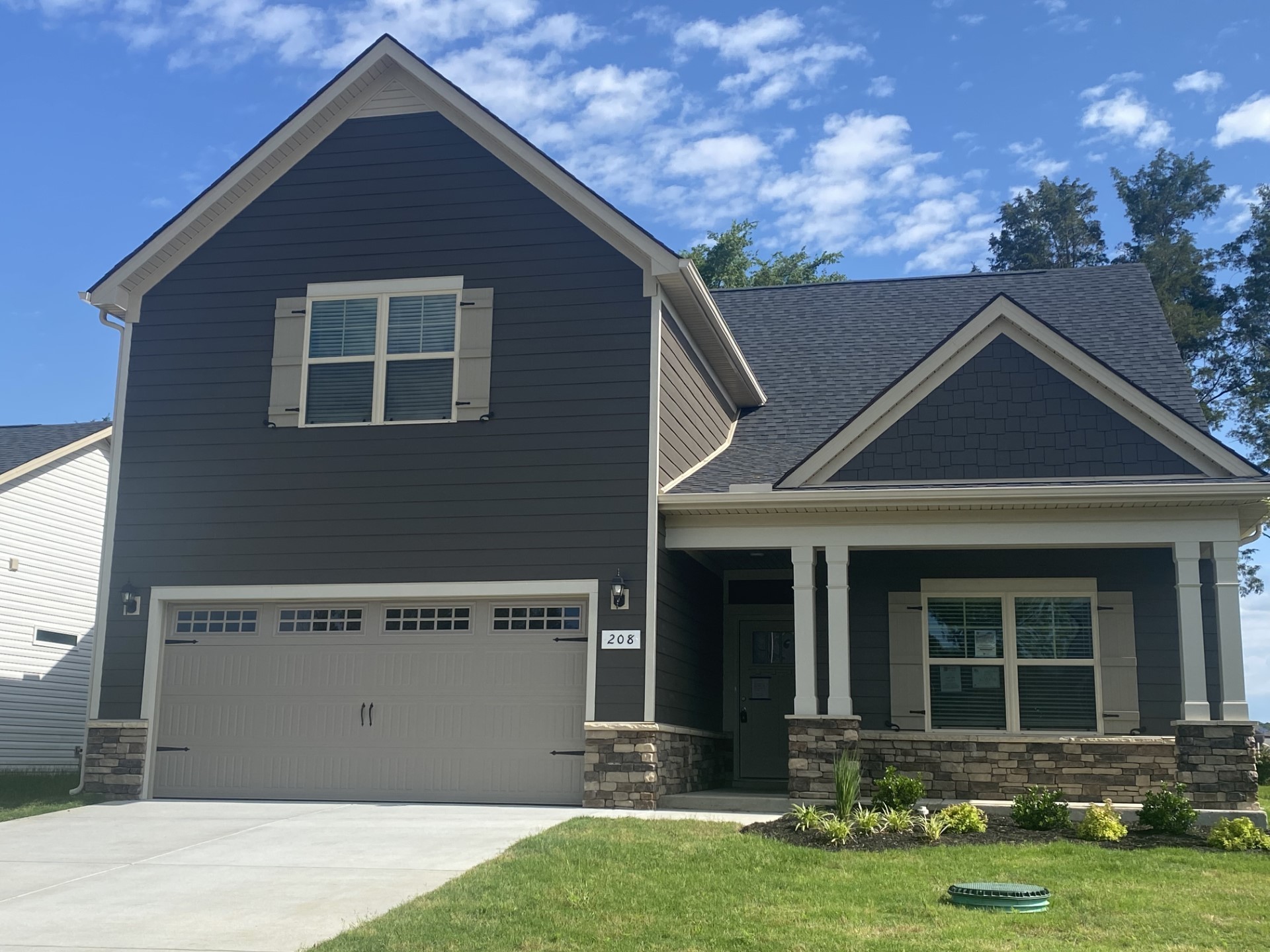 208 Ruby Cate Way Murfreesboro, TN 37128 - Photo 2 of 10 a front view of a house with a yard