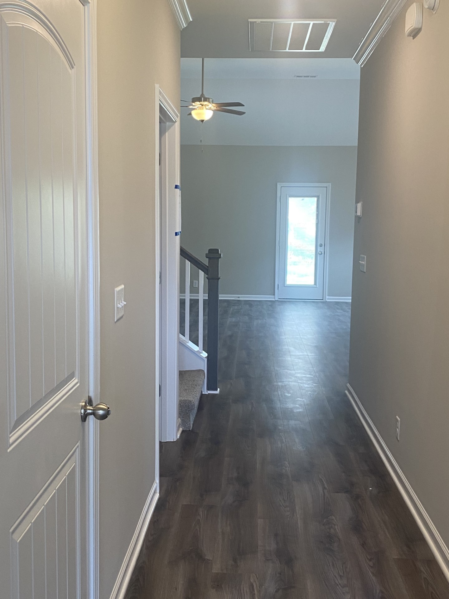208 Ruby Cate Way Murfreesboro, TN 37128 - Photo 3 of 10 a view of a hallway with wooden floor and closet