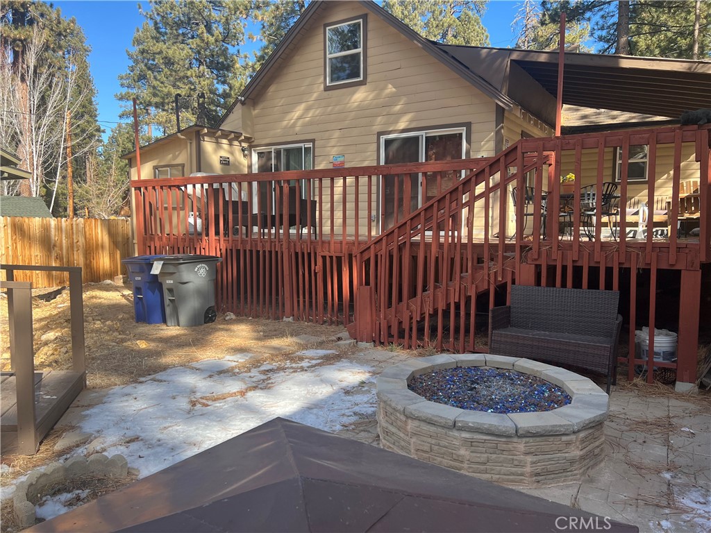 39307 Lark Road Big Bear Lake, CA 92315 - Photo 20 of 35 a view of a porch with a small yard