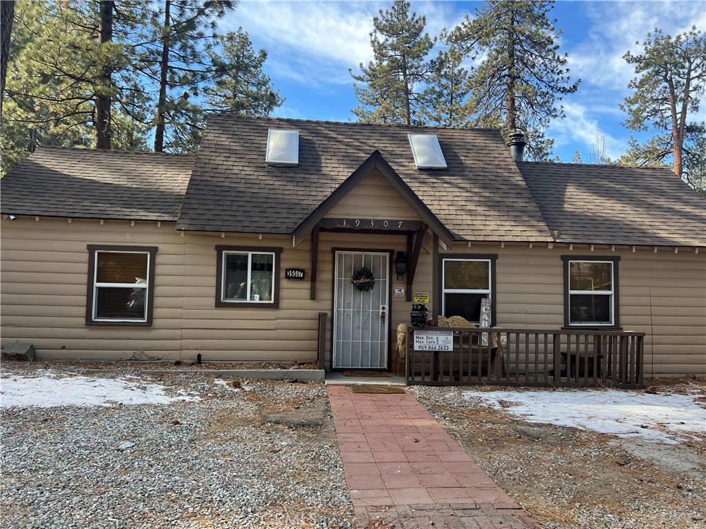 39307 Lark Road Big Bear Lake, CA 92315 - Photo 2 of 35 a front view of a house with yard