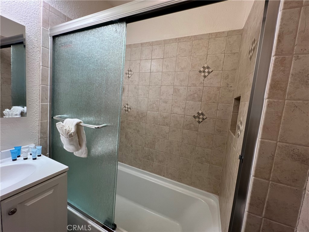 39307 Lark Road Big Bear Lake, CA 92315 - Photo 33 of 35 a bathroom with a sink and mirror