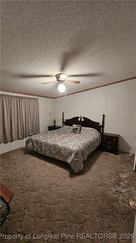 a bedroom with bed and window