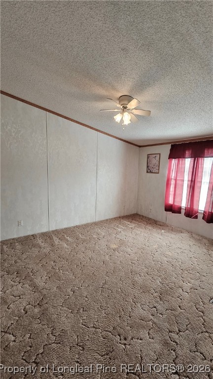 2156 Maxton Street Autryville, NC 28318 - Photo 20 of 38 an empty room with windows and fan