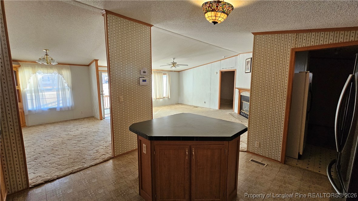 2156 Maxton Street Autryville, NC 28318 - Photo 29 of 38 a bathroom with a sink and a mirror