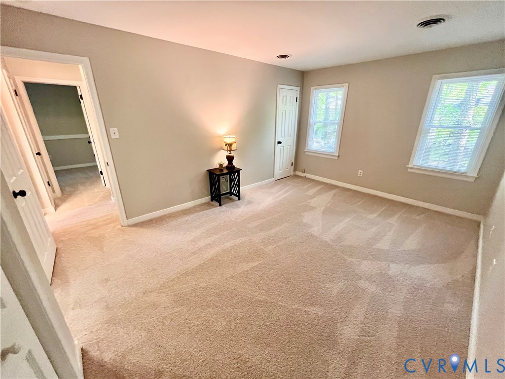 13700 Watkins Glen Road Midlothian, VA 23112 - Photo 14 of 23 an empty room with windows