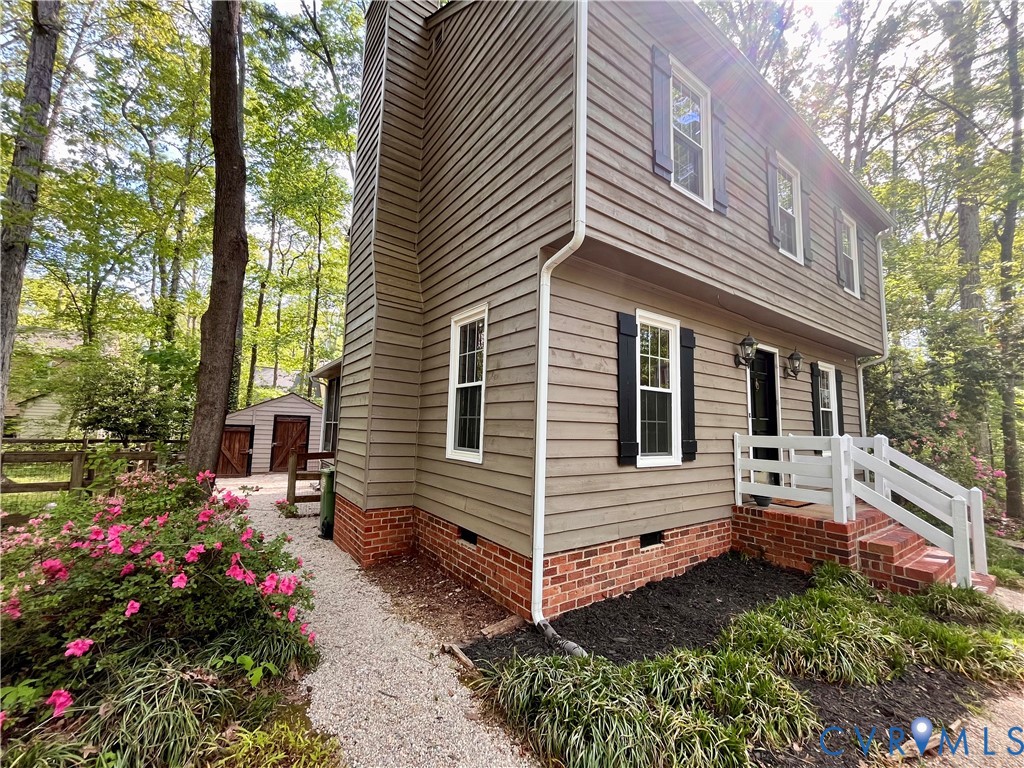 13700 Watkins Glen Road Midlothian, VA 23112 - Photo 21 of 23 a front view of a house with a yard