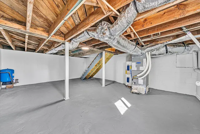 a view of an empty room with stairs