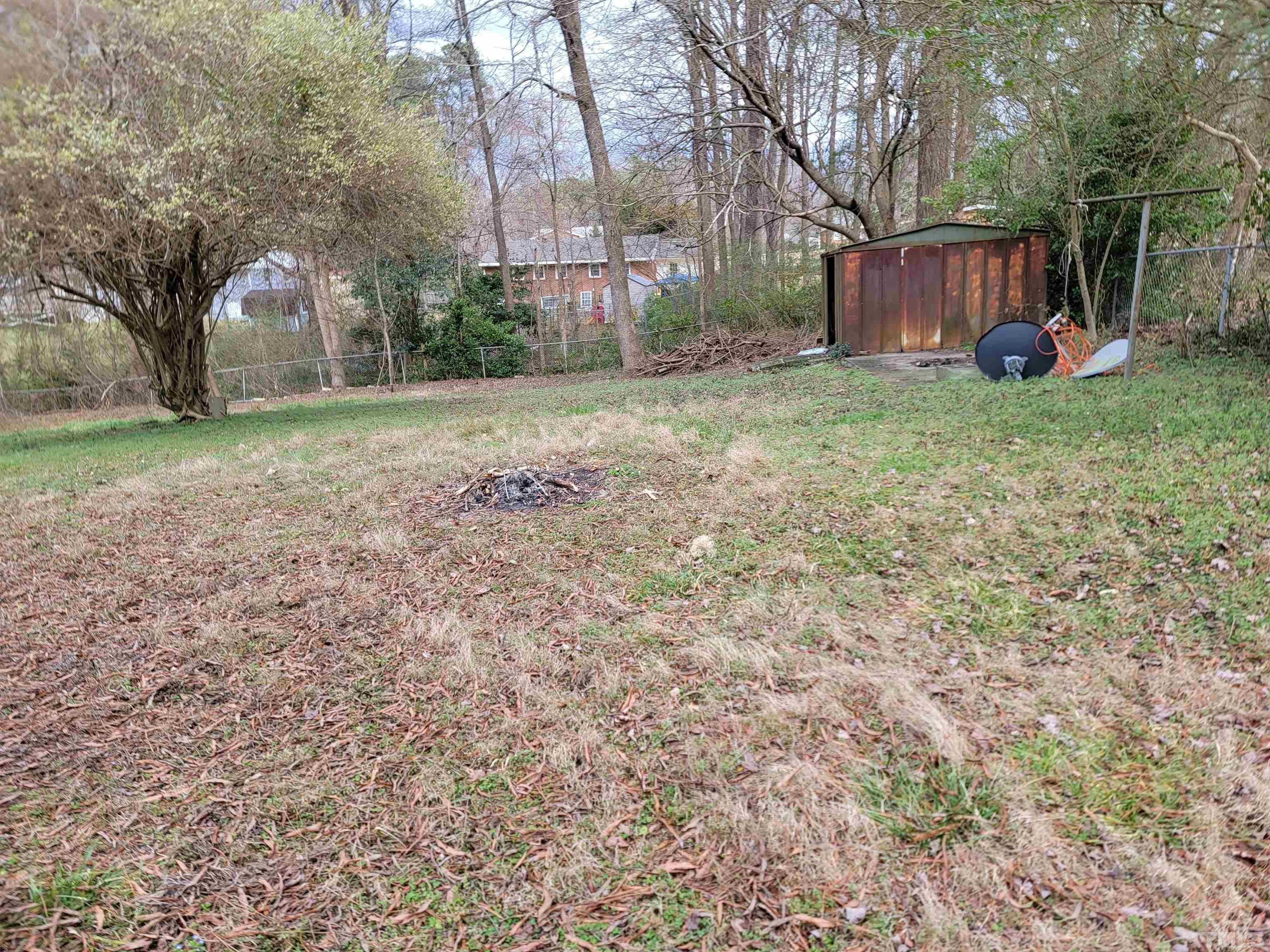 6413 Diamond Drive Raleigh, NC 27610 - Photo 8 of 8 a view of backyard with tree