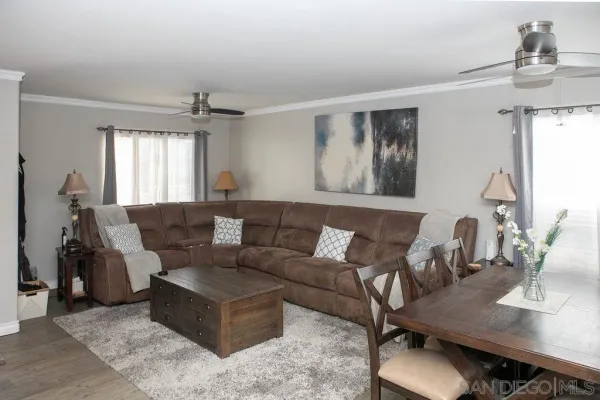 a living room with furniture and window