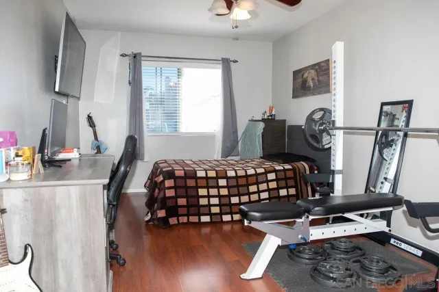 a room with furniture and a flat screen tv