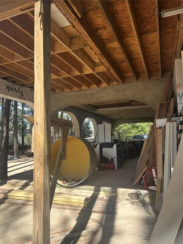 a kitchen with a sink appliances and cabinets