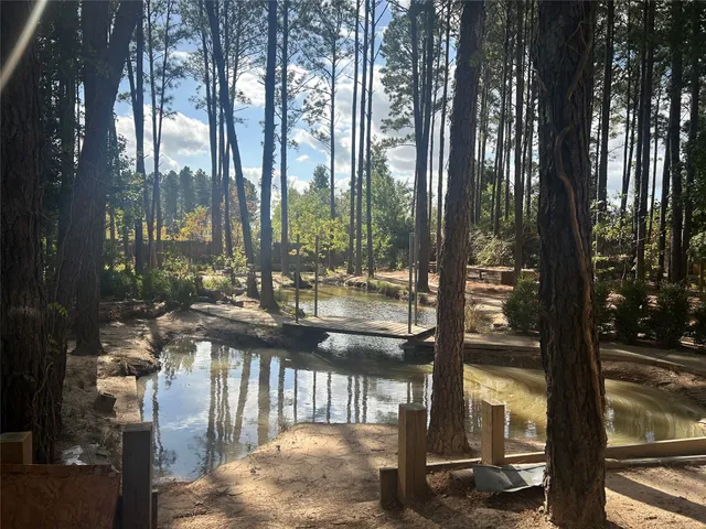 a view of a workspace with furniture