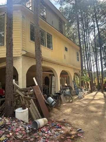 a view of a swimming pool next to a yard