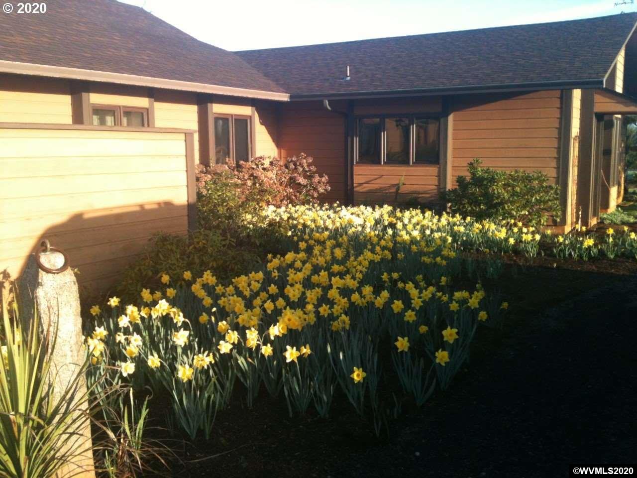1062 Red Hill Road Oakland, OR 97462 - Photo 3 of 8 a front view of a house with a yard