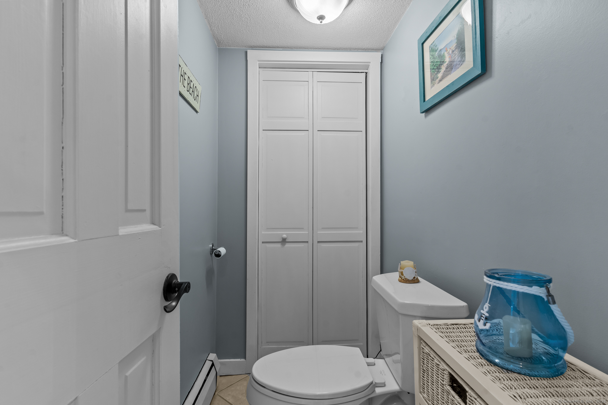 76 New Shore Road Waterford, CT 06385 - Photo 17 of 23 a bathroom with a toilet