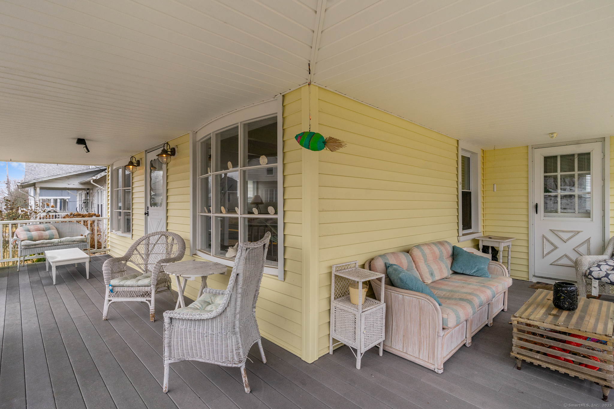 76 New Shore Road Waterford, CT 06385 - Photo 3 of 23 a living room with furniture and wooden floor
