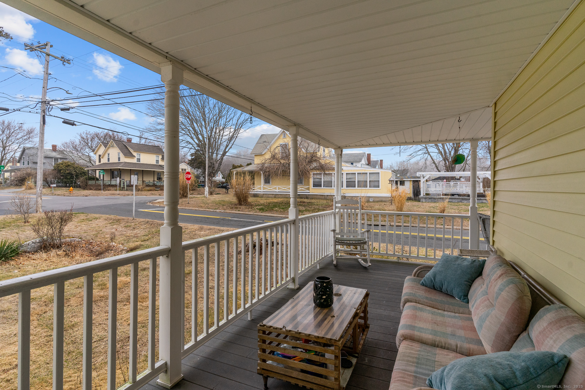 76 New Shore Road Waterford, CT 06385 - Photo 4 of 23 a view of a porch with furniture
