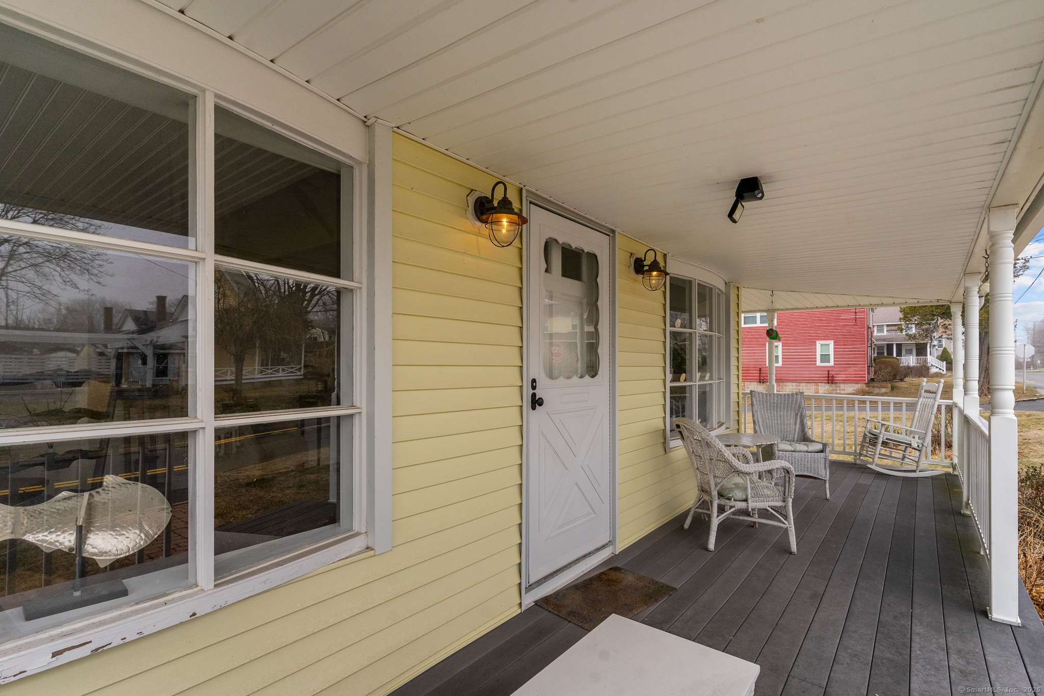 76 New Shore Road Waterford, CT 06385 - Photo 5 of 23 a room with wooden floor and furniture