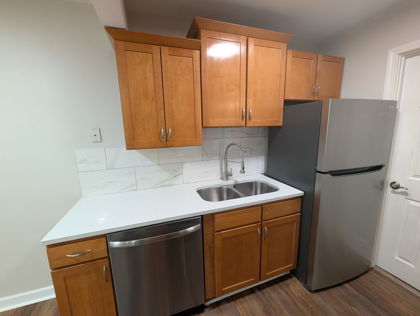 4303 South Harlem Avenue, Unit 6 Stickney, IL 60402 - Photo 7 of 13 a kitchen with a sink and cabinets