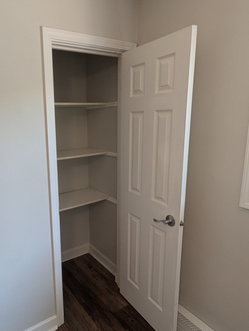 4303 South Harlem Avenue, Unit 6 Stickney, IL 60402 - Photo 10 of 13 a view of walk in closet with empty racks