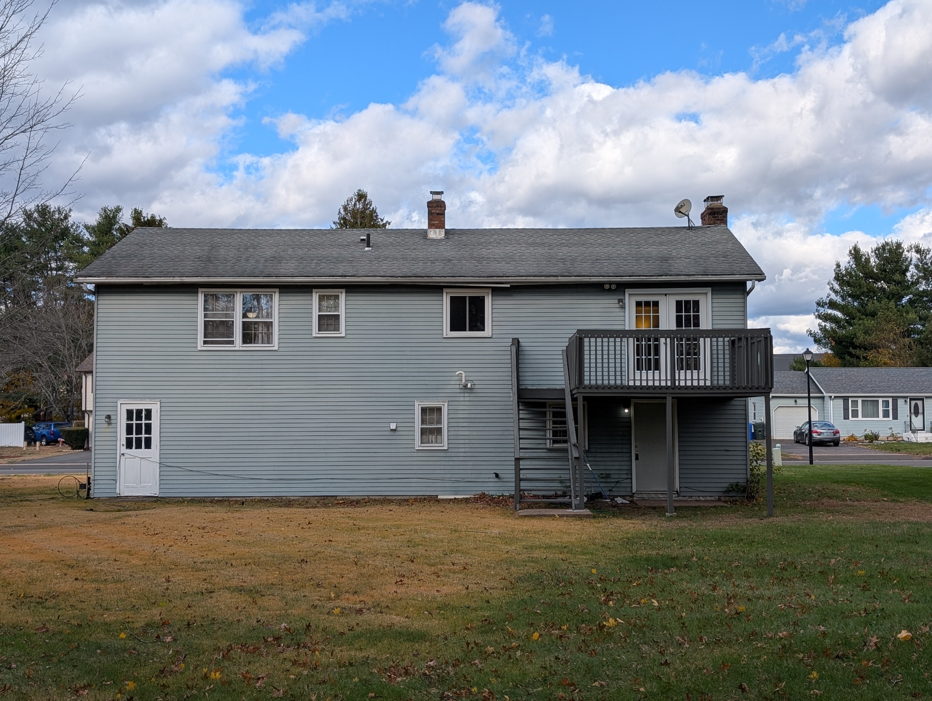59 Pheasant Lane East Hartford, CT 06108 - Photo 3 of 8 a front view of a house with a garden