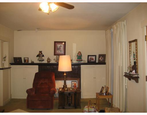 103 Reed Avenue Belle Vernon, PA 15012 - Photo 3 of 14 Living Room. Livingroom has fireplace that hasn t been used in years. It is flanked by bookcases