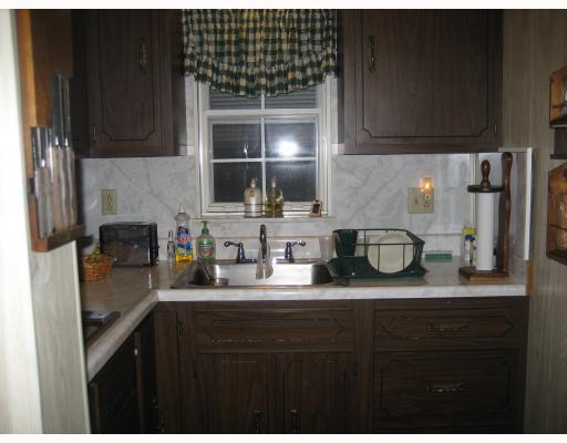 103 Reed Avenue Belle Vernon, PA 15012 - Photo 5 of 14 Kitchen. This is the work area of the kitchen. There s additional area for table & chairs