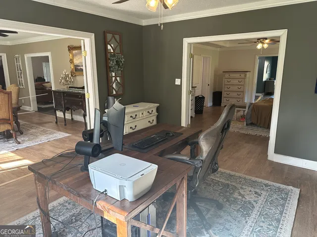 a living room with furniture and a table