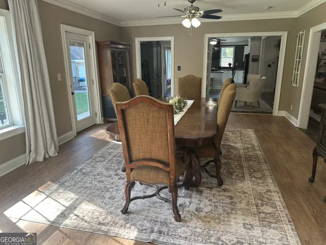 a view of a dining room with furniture