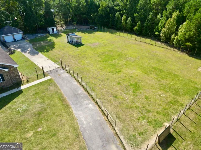 a view of swimming pool with garden