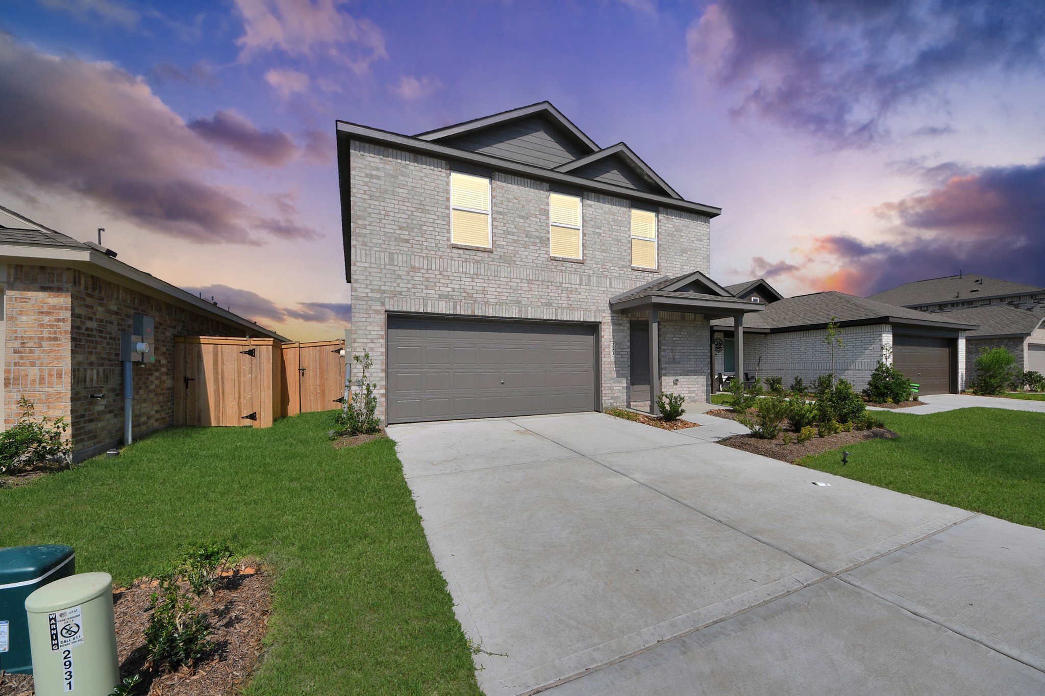 2931 Summer Breeze Way Angleton, TX 77515 - Photo 1 of 30 a front view of a house with a yard and garage