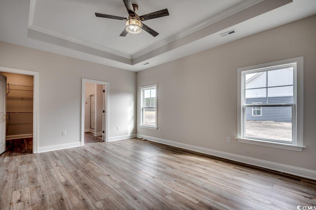 4975 Dupont Road Aynor, SC 29511 - Photo 12 of 22 Unfurnished bedroom with crown molding, ensuite ba