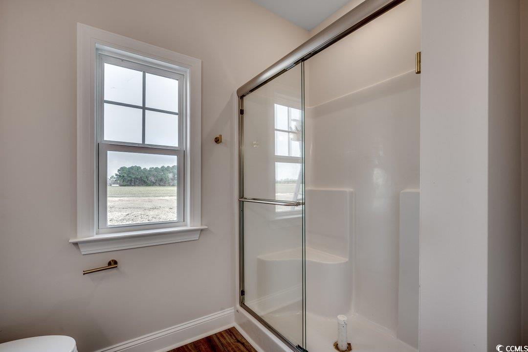 4975 Dupont Road Aynor, SC 29511 - Photo 14 of 22 Bathroom with toilet and an enclosed shower